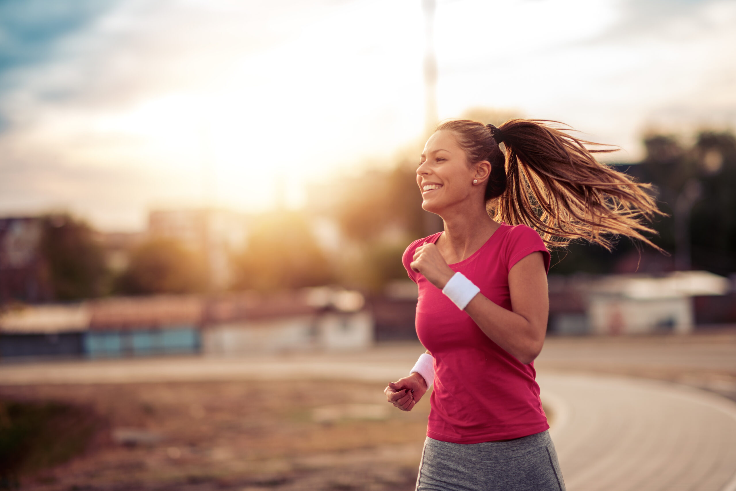 woman_running_jogging_track_skinny-shot_smooth_aesthetics_austin